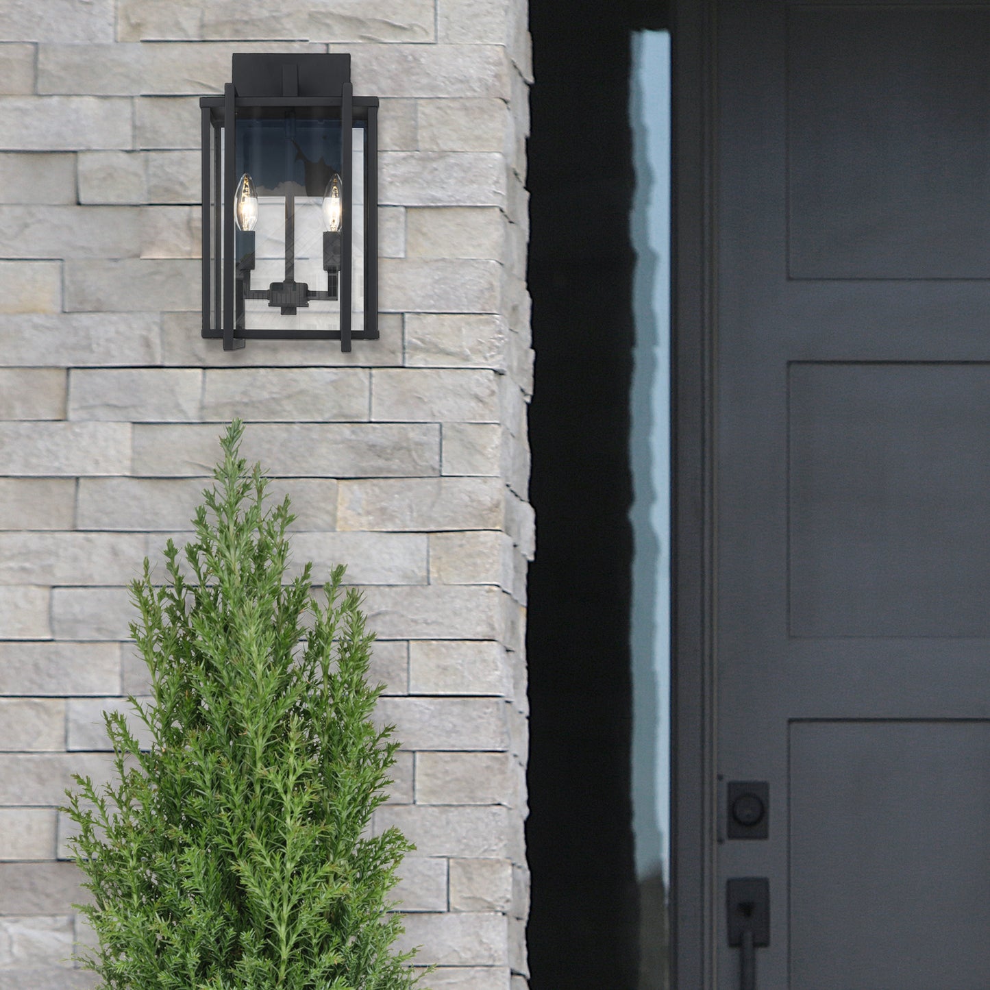 Wilshire Modern Black Wall Sconce - Outdoor with Clear Shade